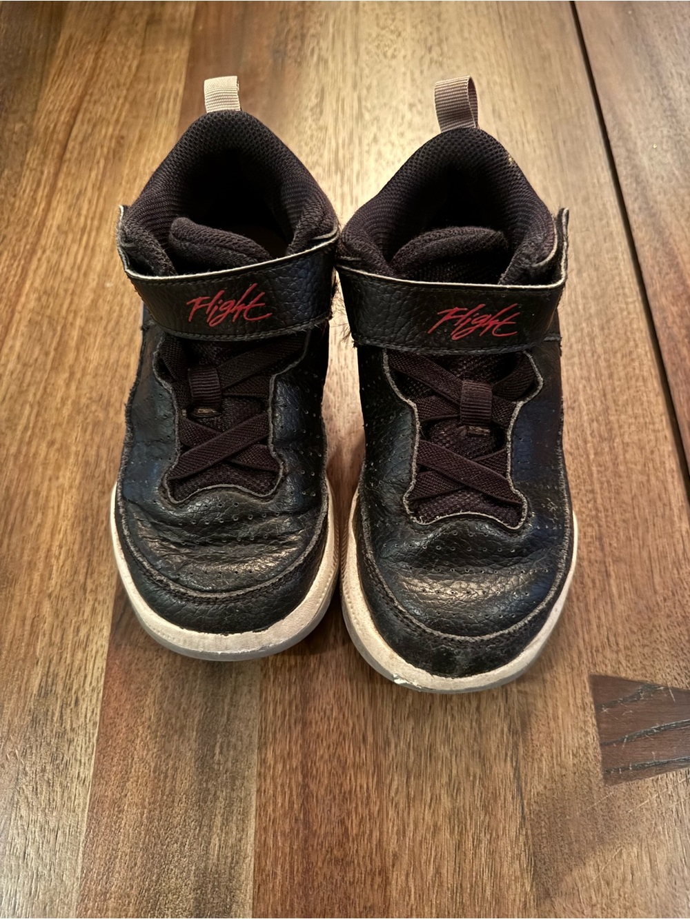 Jordan Kids Black Sneakers with Red 'Flight' Accent